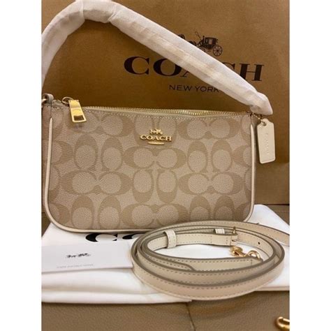 tas coach kecil